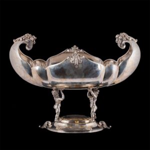 Massive Italian silver centerpiece on putti legs — image 1