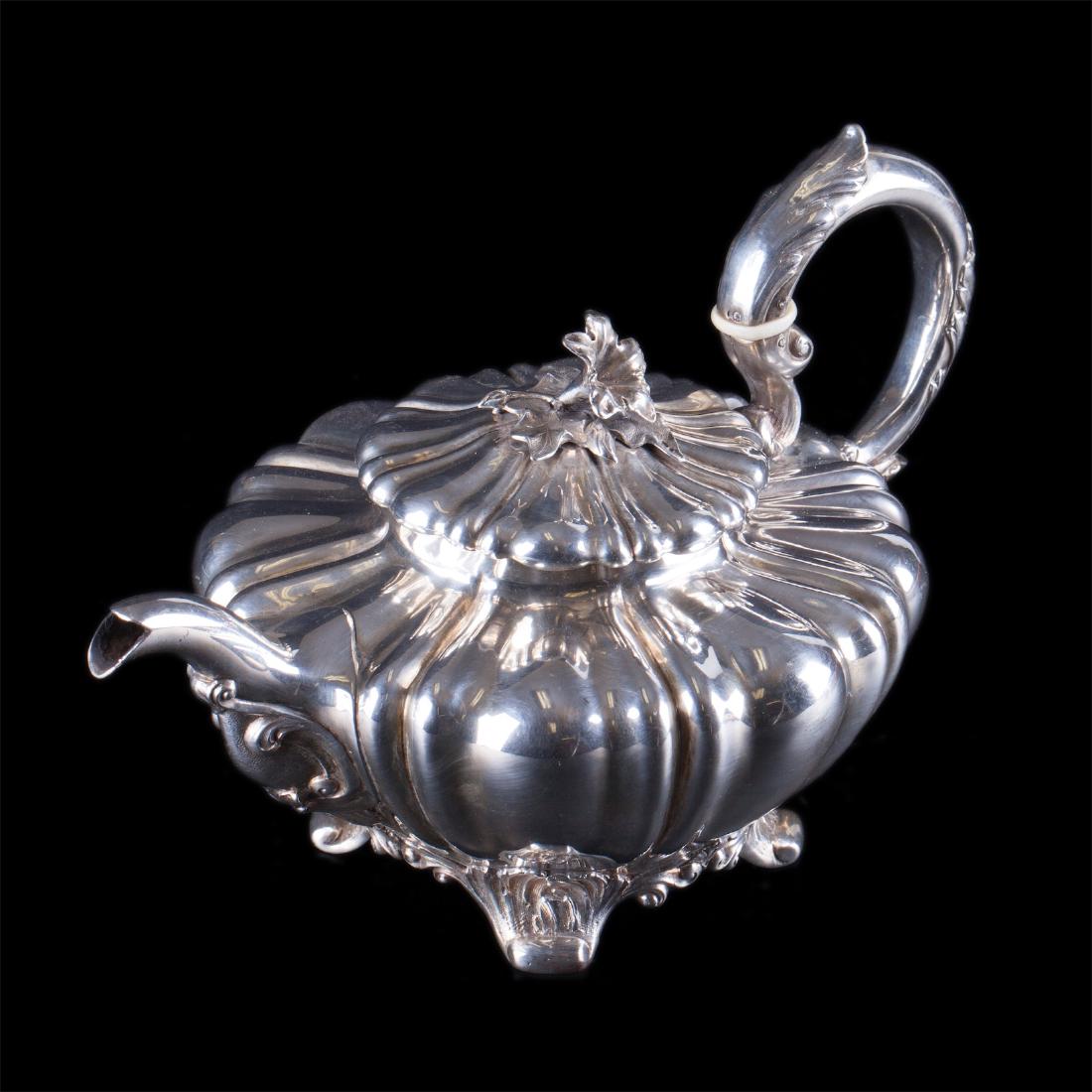 Antique English silver tea pot — image 1