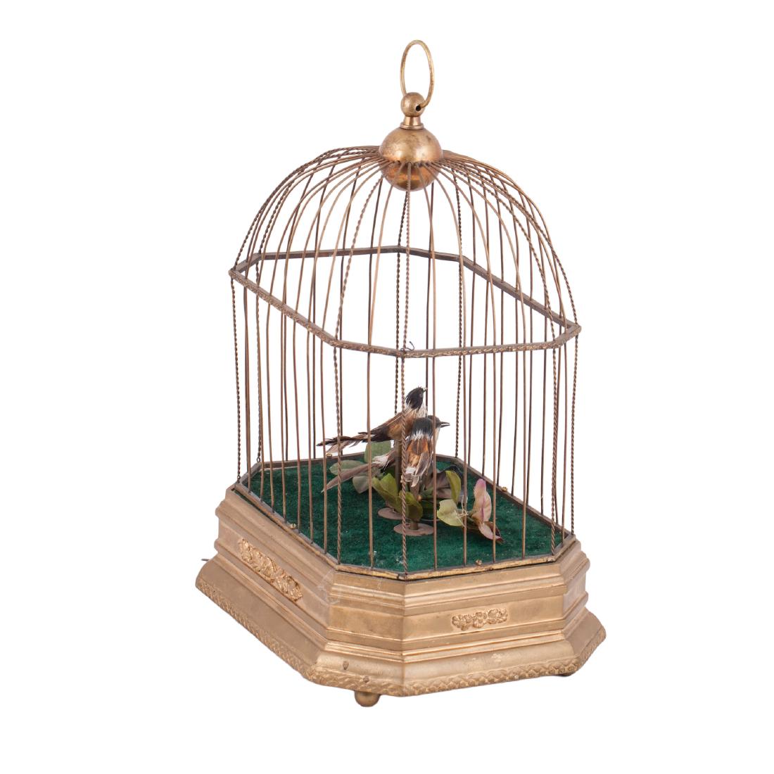 Musical antique cage with three birds in it — image 3