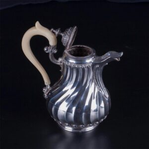 Antique French silver creamer with white material — image 2