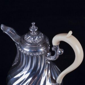Antique French silver creamer with white material — image 3