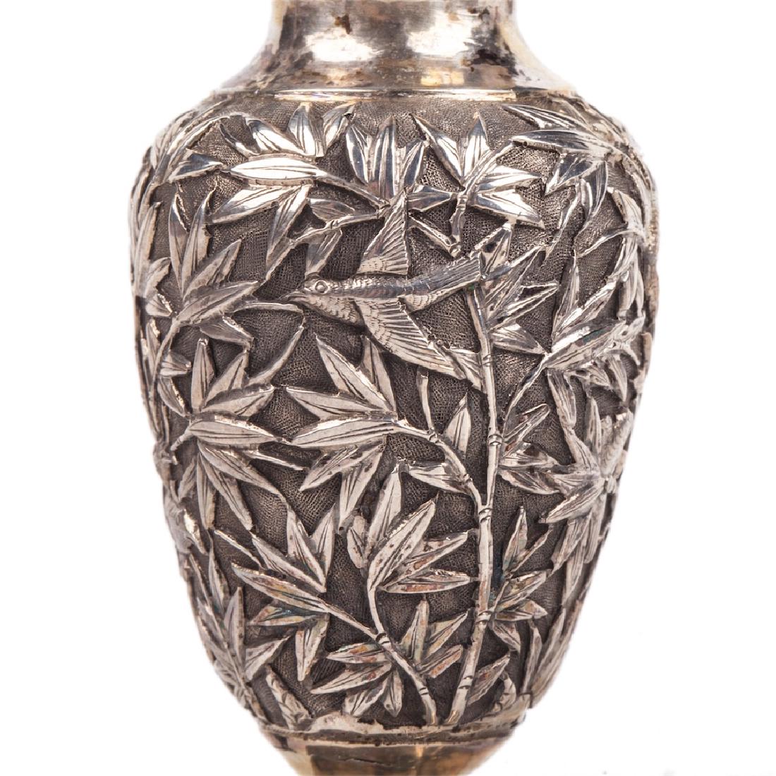 A pair of antique silver salt cellars with floral — image 2