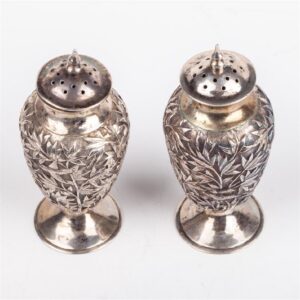 A pair of antique silver salt cellars with floral — image 4