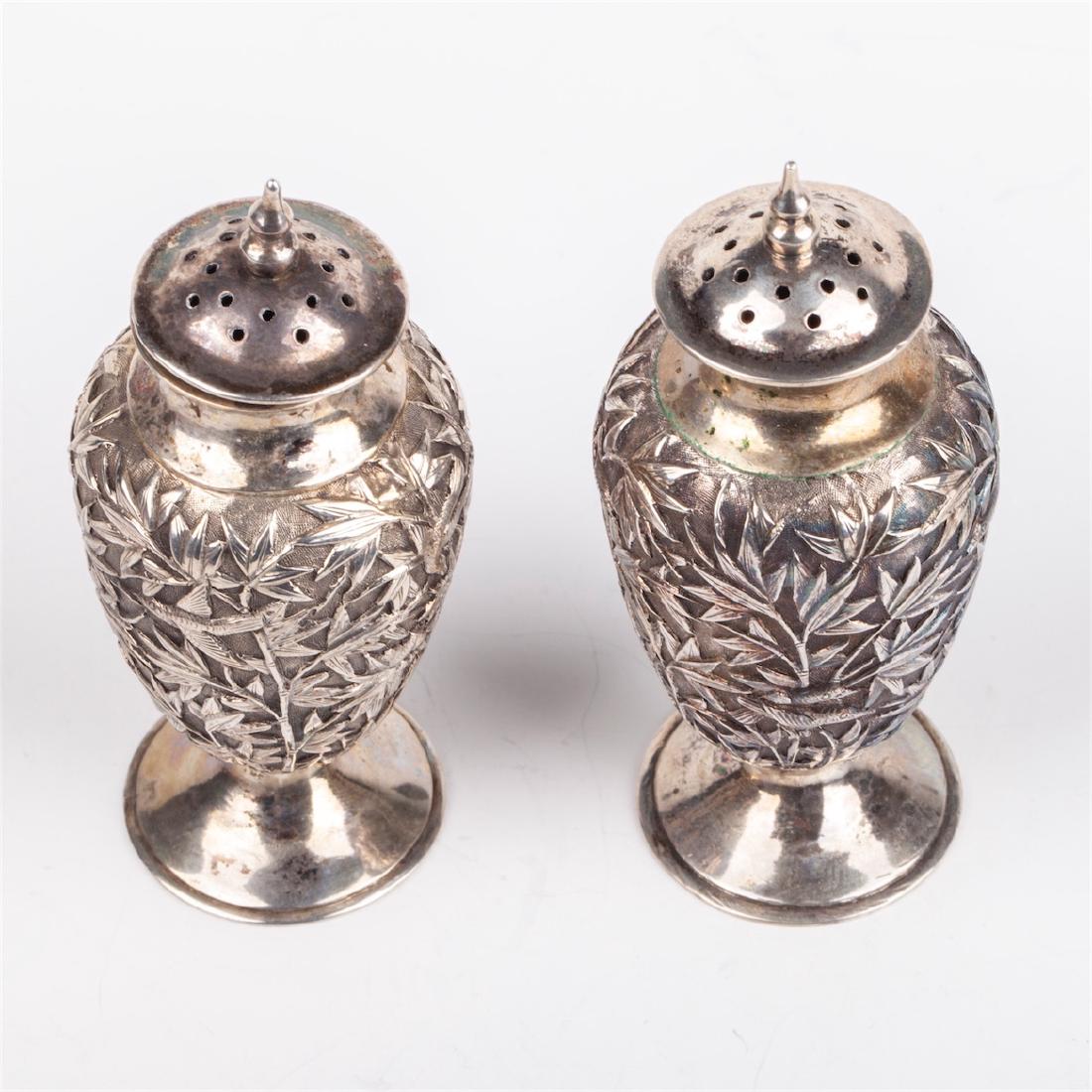 A pair of antique silver salt cellars with floral — image 4