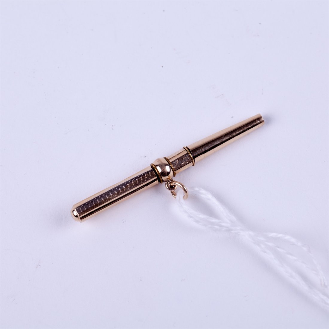 Gold watch key. — image 1