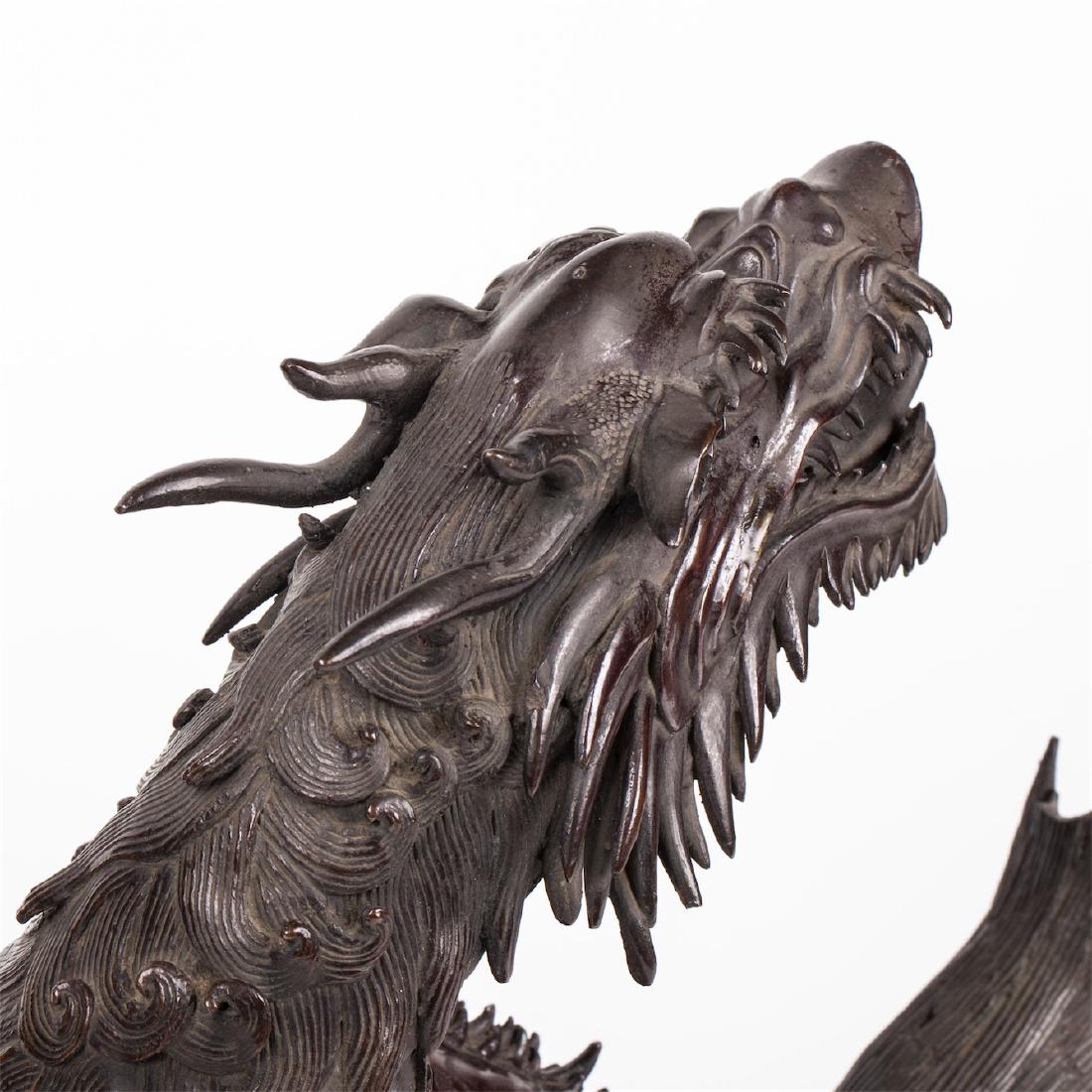 A pair of Chinese bronze dragon sculptures — image 3