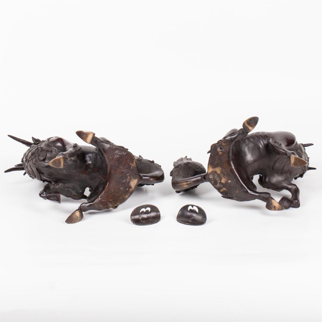 A pair of Chinese bronze dragon sculptures — image 7