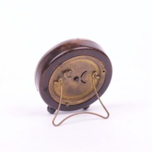 Desc clock with silver on legs. — image 2