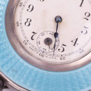 Desc clock with silver on legs. — image 3