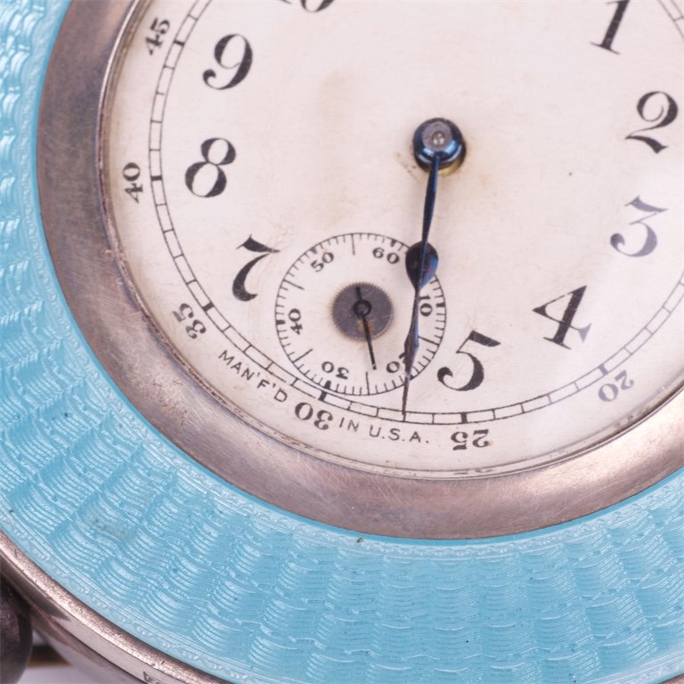 Desc clock with silver on legs. — image 3