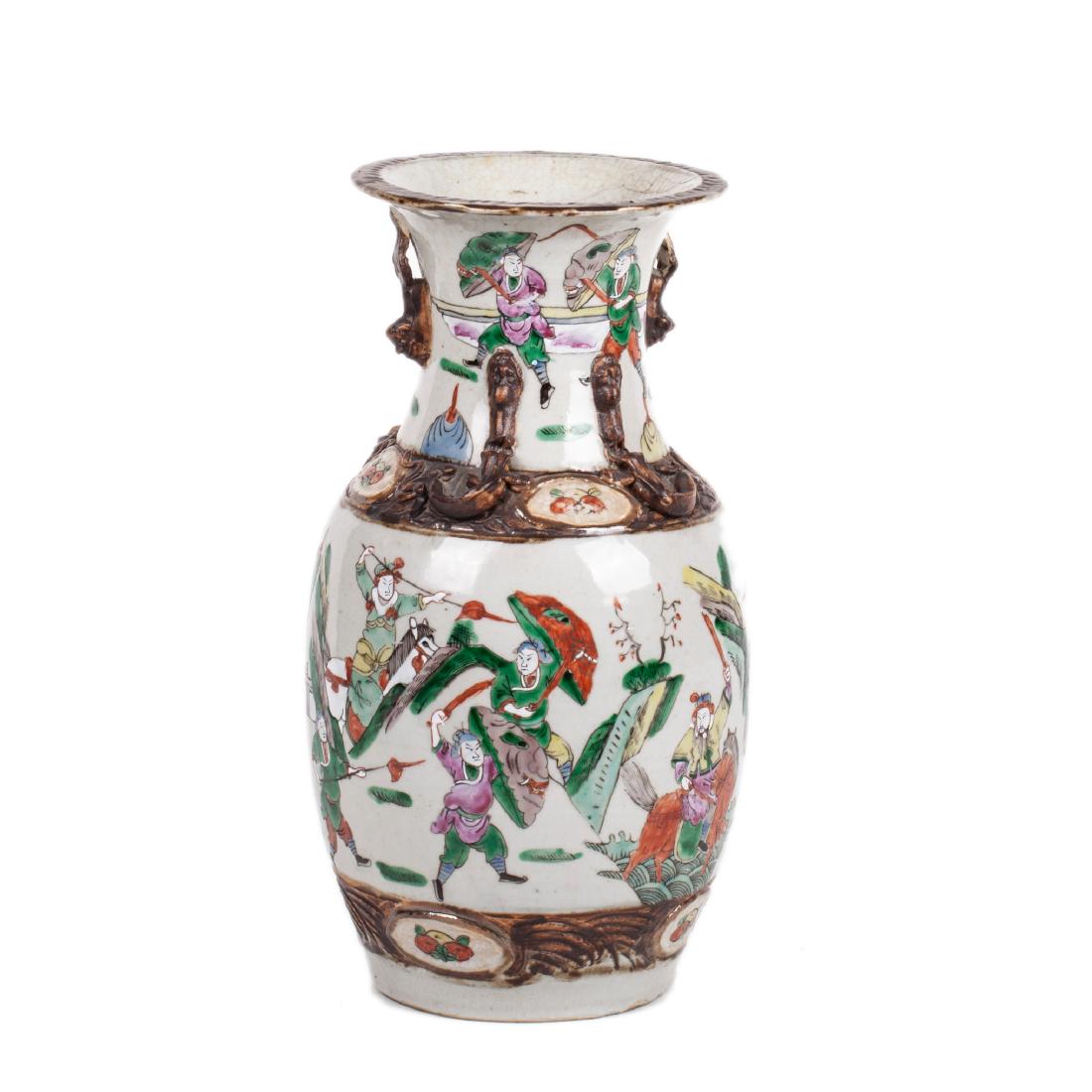Antique Chinese porcelain vase with battle scenes — image 1