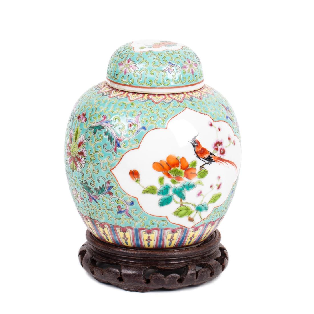 Antique Chinese porcelain vase on a wooden stand — image 1