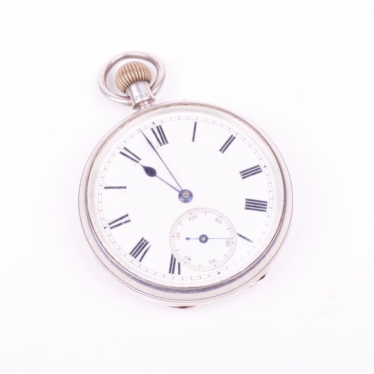 Silver pocket watch. — image 1