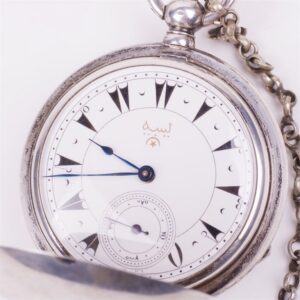 Silver pocket watch with the key. — image 2