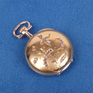 Gold pocket watch with jewels. — image 1