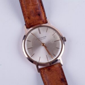"Movado" gold 18k wristwatch. — image 1