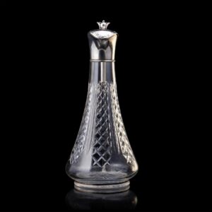 A Faberge silver-gilt and cut-glass decanter — image 2