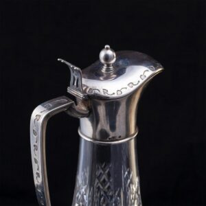 A Faberge silver-gilt and cut-glass decanter — image 3