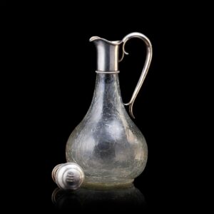 A Faberge silver-gilt and cut-glass carafe — image 2