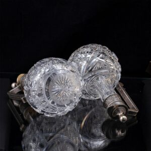 A pair of Faberge silver and cut-glass decanters — image 4