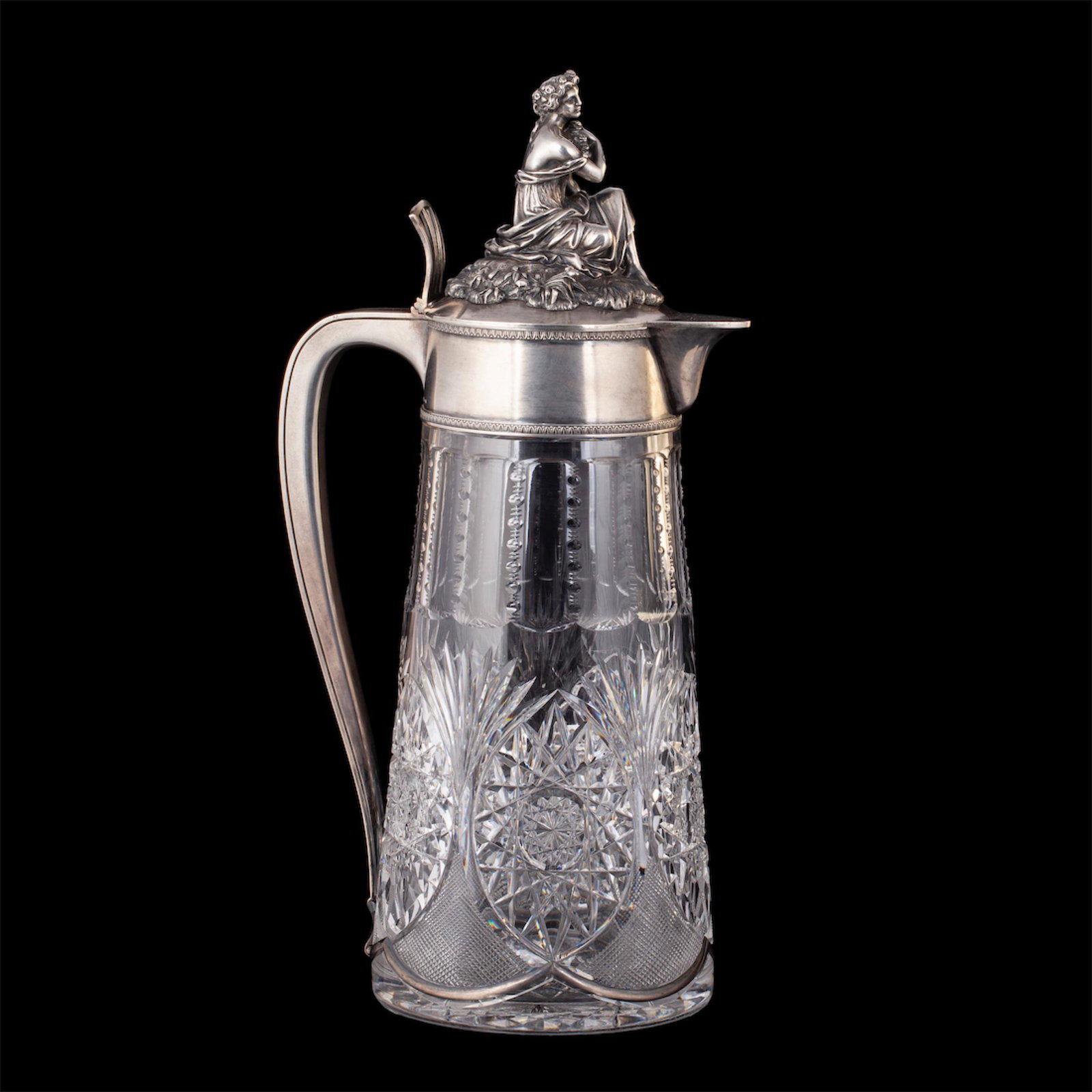 An unusual massive carafe with a cast figure — image 1