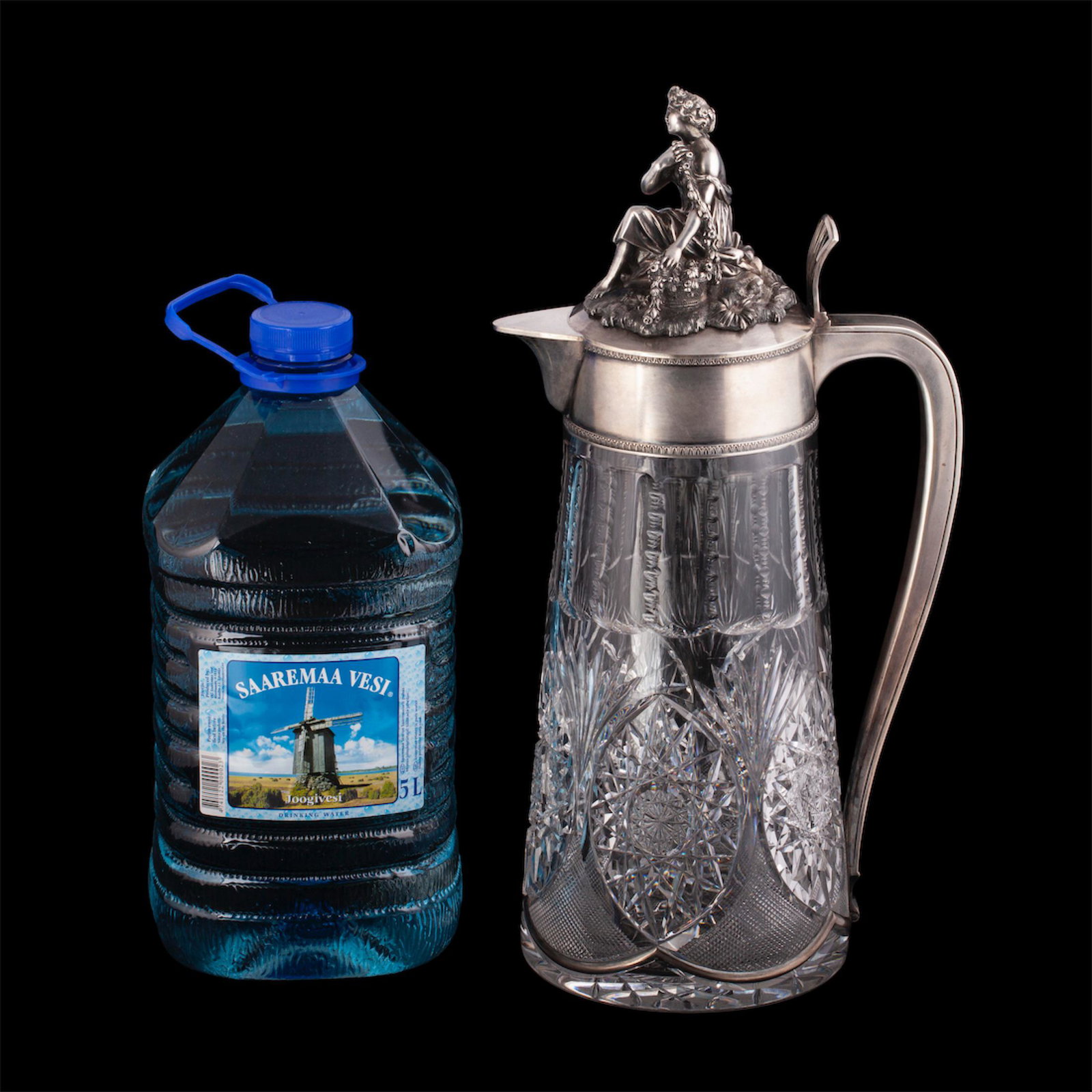 An unusual massive carafe with a cast figure — image 2