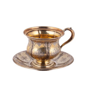 A Russian silver-gilt tea cup and saucer — image 1