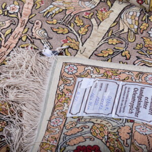 An oriental Hereke rug with silk thread — image 3