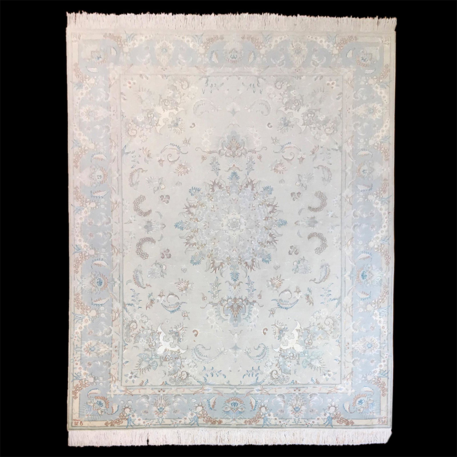 A Persian wool Tabriz rug — image 1