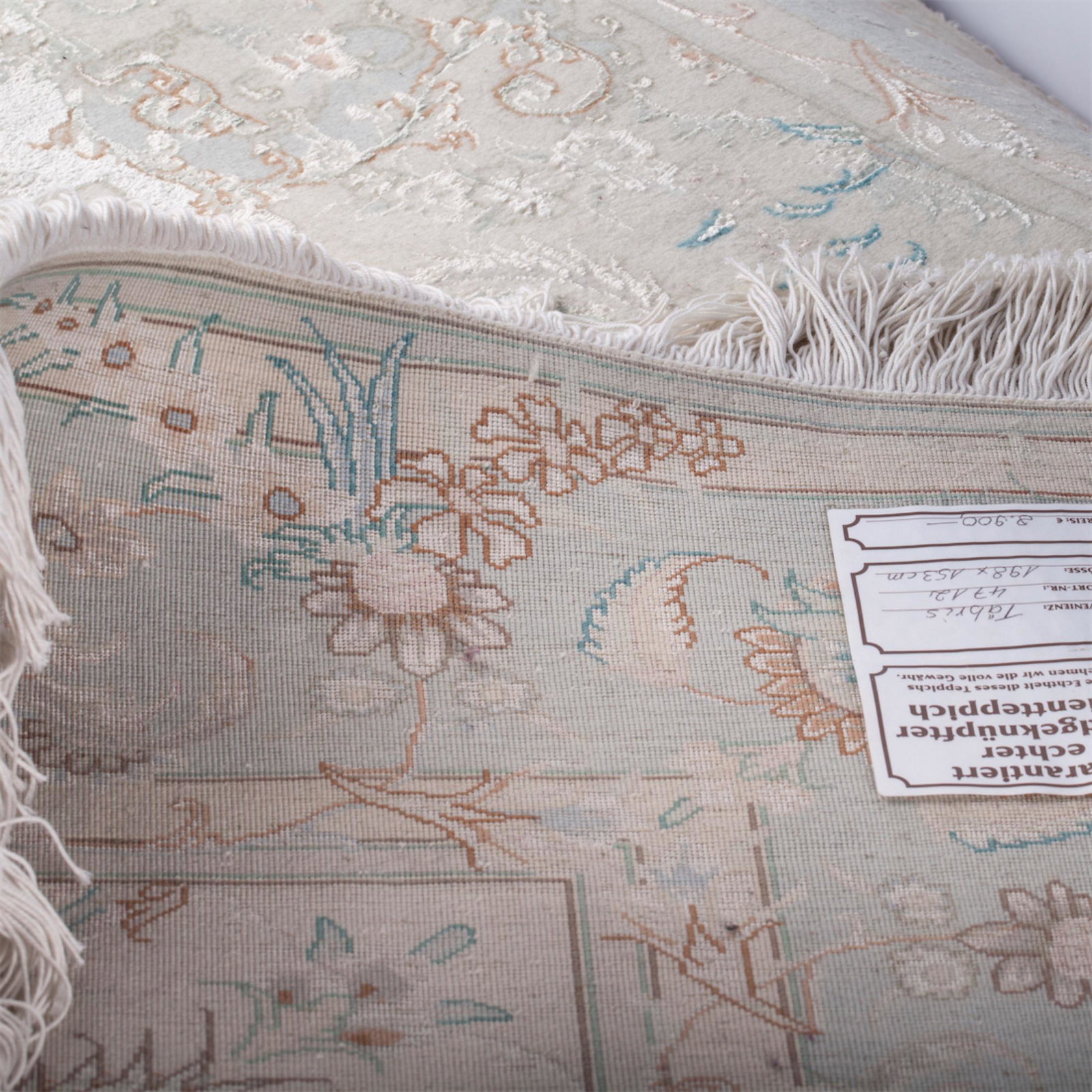 A Persian wool Tabriz rug — image 6